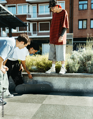 Skaters Preparing Ledge for Trick in the City