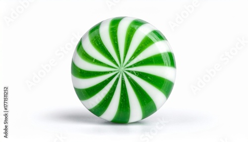 Peppermint swirl candy with green white red pattern and mint leaf on white background for editorial culinary photography festive design and poetic flavor-themed visuals