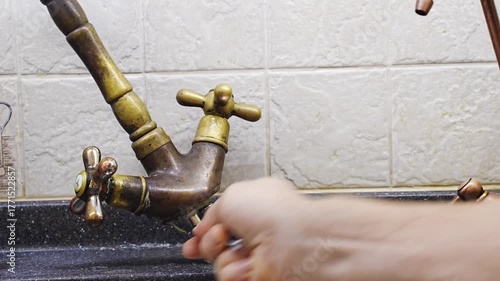 replacement of the water faucet in the kitchen. repair and installation of a water tap. plumbing services.
