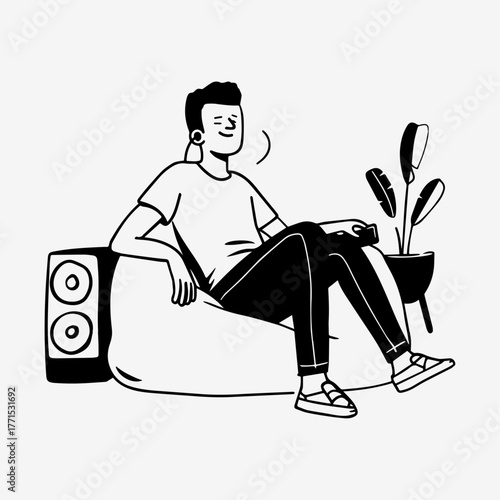 Person relaxing on a beanbag sofa and listening music from nearby speakers.
