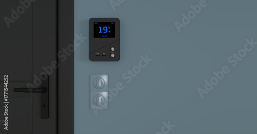 gros plan sur un thermostat d'ambiance avec le chauffage à 19°c pour faire des économies d'énergie