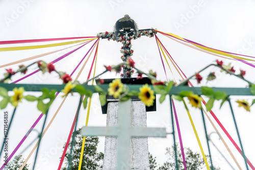 Wallpaper Mural Catholic cross decorated with ribbons and flowers, Poland Torontodigital.ca