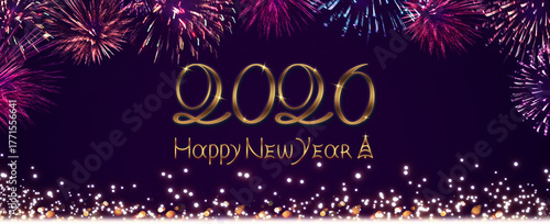 New Year 2026 lettering with fireworks lights in the purple background.