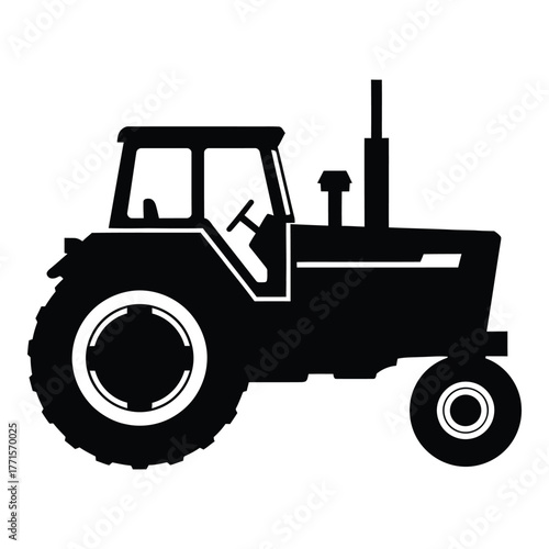 Silhouette of a classic farm tractor with large rear wheels and a detailed cab for agricultural work and rural scenes silhouette