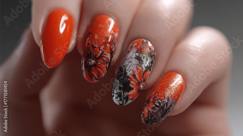 Artistic Orange and Black Floral Nail Art