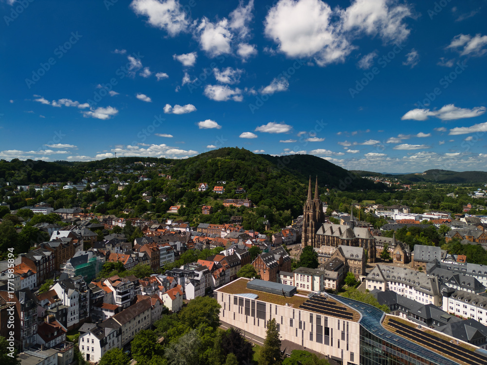 Fototapeta premium Aerial View of European Town with Church and Modern Buildings
