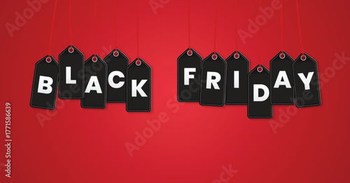 Black friday sale tags hanging on red background