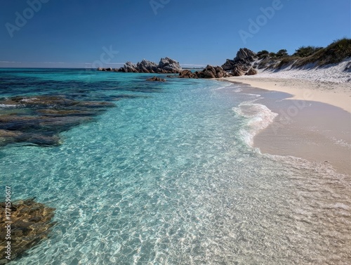 Stunning Seascape Clear Turquoise Waters White Sandy Beach Rocky Coastline Blue Sky Tranquil Ocean Scene Natural Beauty Idyllic Coastal Landscape Serene Tropical Environment