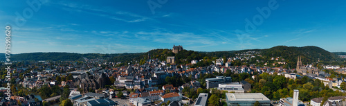 Aerial View of European City with Castle on Hill