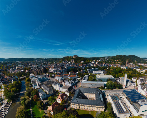 Aerial View of European City with Castle on Hill