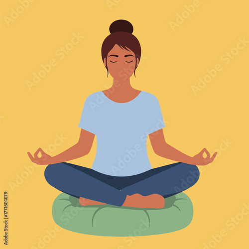 Woman Meditating in Lotus Position on Cushion for Relaxation