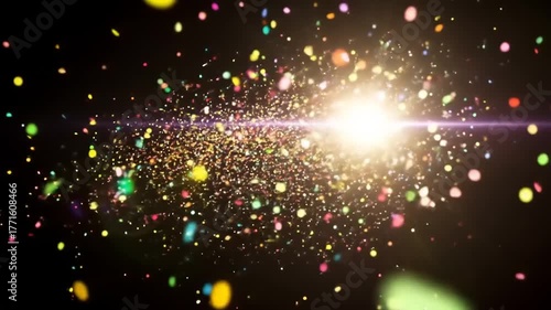Colorful light particles swirling in dark background