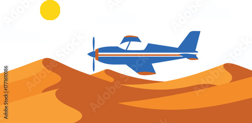 Blue airplane flying over sand dunes on a sunny day with clouds