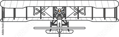 A vintage biplane with a pilot soars through the sky, front view