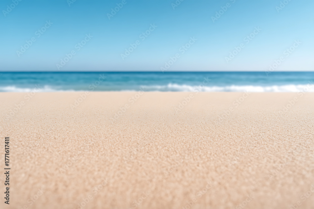Fototapeta premium Escape to paradise! Golden sands meet clear turquoise waters under a bright, cloudless sky. A serene beach scene perfect for relaxation and unforgettable summer days. #beachlife