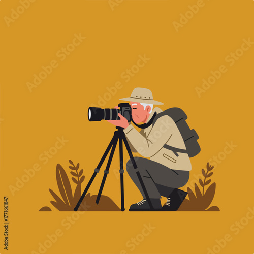 An elderly photographer wearing a hat and backpack kneels, using a tripod with a camera amongst simple foliage