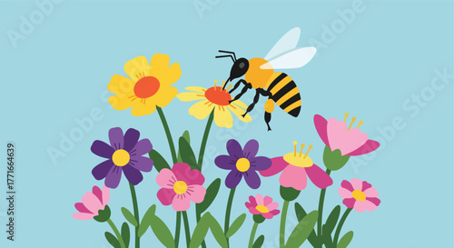 Bee hovering over flowers
