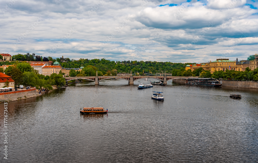Fototapeta premium Manes Bridge and Tourist Boats on Vltava River.