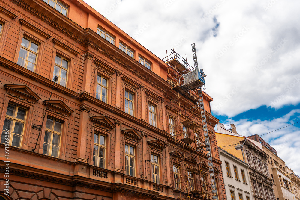 Fototapeta premium Historic Building Renovation Scaffoldings and Construction Hoist.