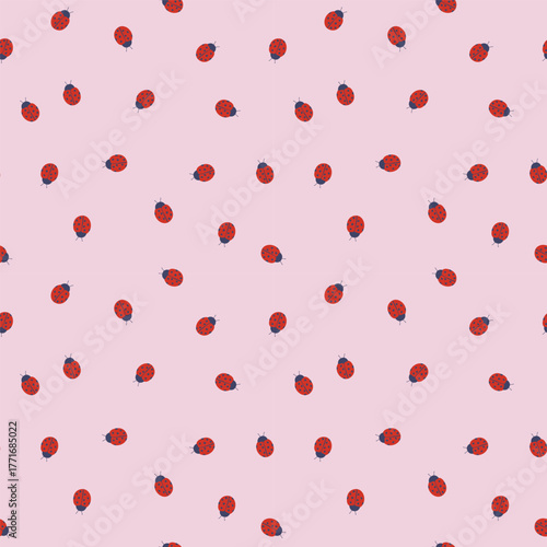 Ladybug seamless pattern on pink background