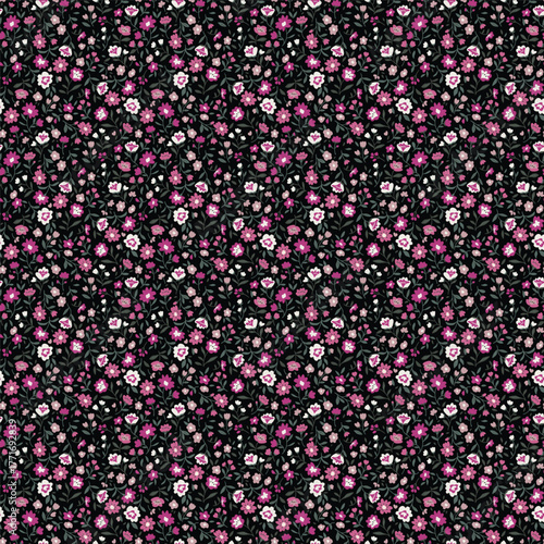 ditsy pattern with small flowers on dark background
