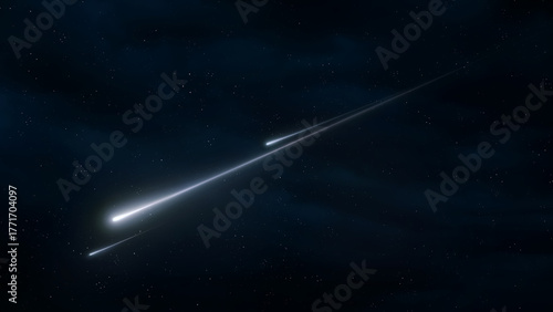 Fototapeta Naklejka Na Ścianę i Meble -  Fireballs shine brightly in the night sky. Shooting stars on a dark background. Meteor trails in the atmosphere.