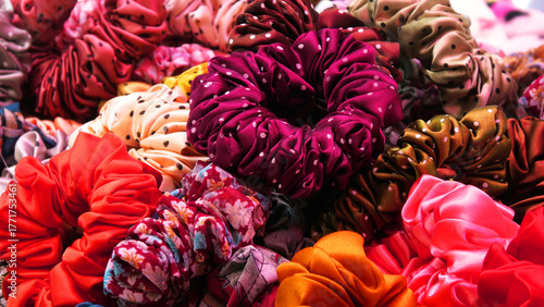 Colorful fabric hair bands displayed in a beauty shop