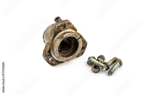 A close-up of a dirty, oily wheel hub assembly with bolts on a white background. The image reflects the essence of repair and maintenance.