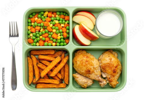 Healthy school lunch tray with chicken carrots peas apples and yogurt isolated on transparent background