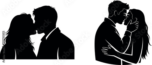 Silhouettes of a romantic couple embracing and kissing in a tender moment of love and passion