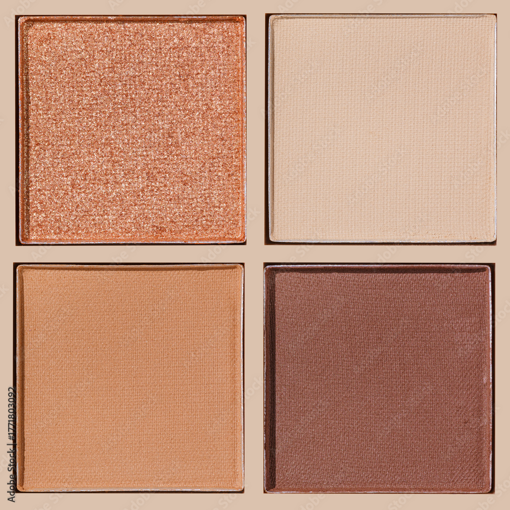 Fototapeta premium Closeup view Neutral Eyeshadow Palette with Matte and Shimmer, beige brown with golden shimmer shades. Top view of eyeshadow refills, Swatches powder eyeshadow or highlighter, cosmetic beauty, makeup
