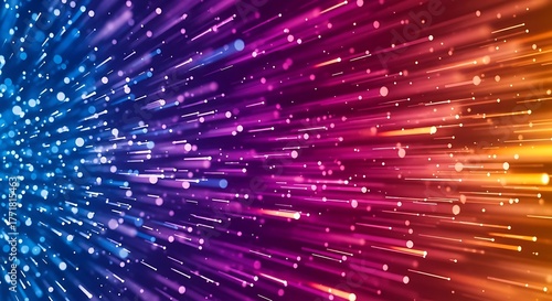 Abstract background with colorful light streaks and particles creating a dynamic sense of motion and energy.