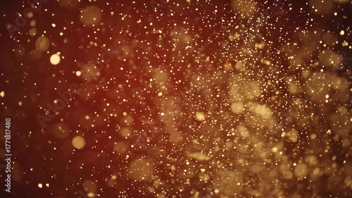 Sparkling Gold Particles Create a Magical Atmosphere at a Festive Celebration
