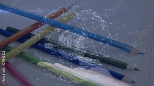 On code snippet appearing network sphere forming over pencils open palm holding rotating data globe