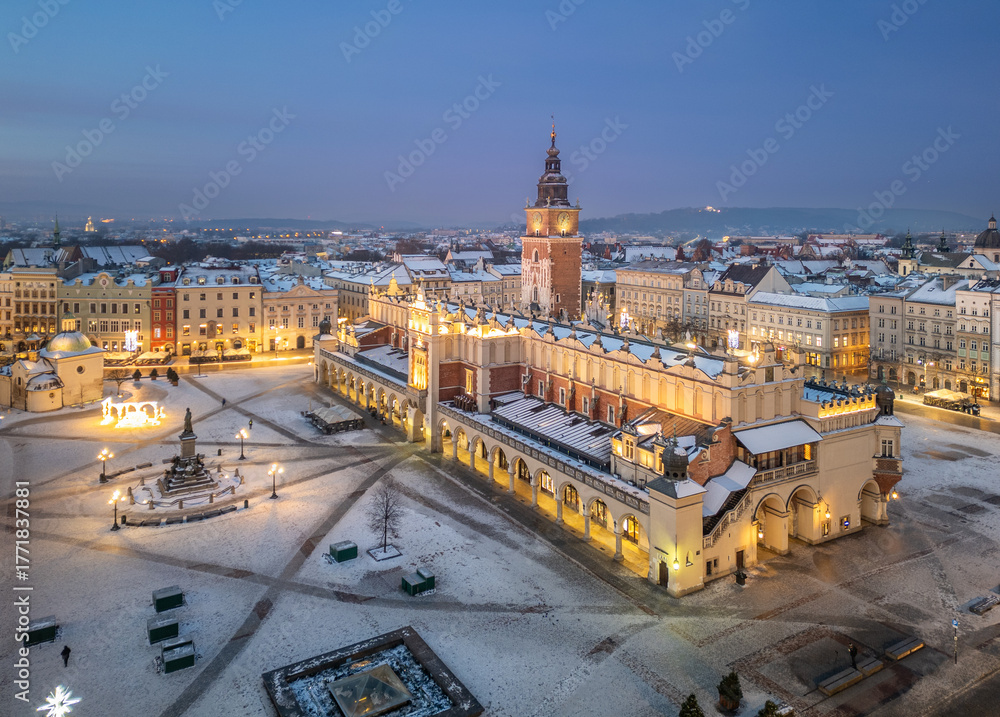custom made wallpaper toronto digitalAerial late night / dawn view of snow covered Main Square with Cloth Hall and Town Hall Tower in Krakow, Poland