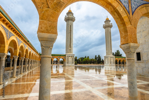 Photography Two minarets tower of mausoleum of Habib Bourguiba on a cloudy day with decorate