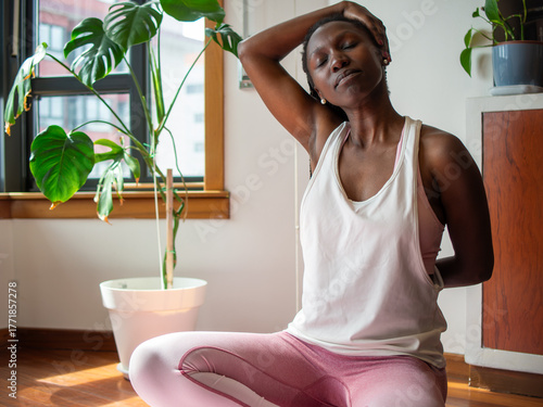 A young woman doing her daily yoga and pilates