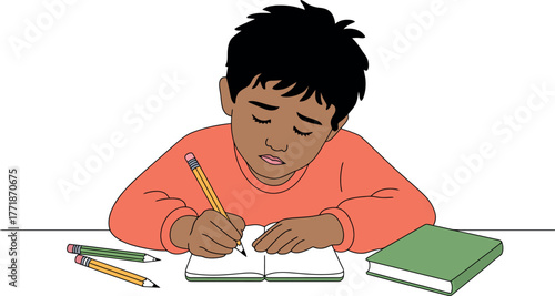 A young boy is diligently writing in his notebook at a desk.