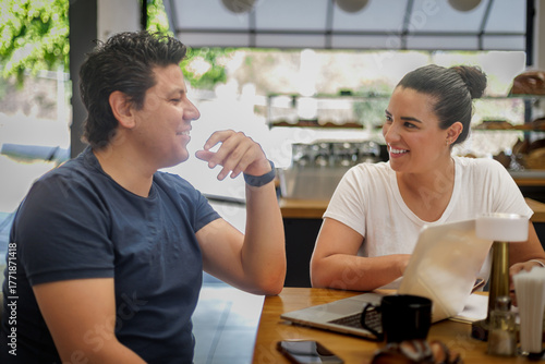 Couple Working and Chatting in a Bakery