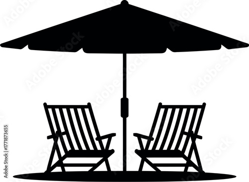 Two empty deck chairs under a large umbrella on a sunny day.