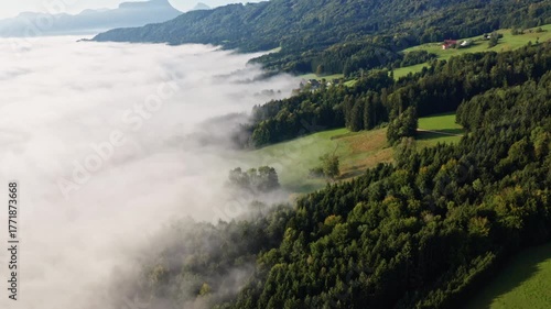 Peaceful Fog Over Lake Irrsee, Austria – 4K Aerial Drone Footage of Misty Hills and Mountains in Daylight