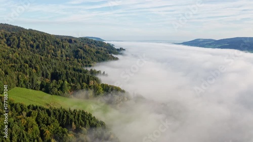 Peaceful Fog Over Lake Irrsee, Austria – 4K Aerial Drone Footage of Misty Hills and Mountains in Daylight