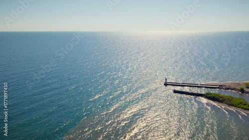 aerial view of the sea side and waves crashing on sea shore