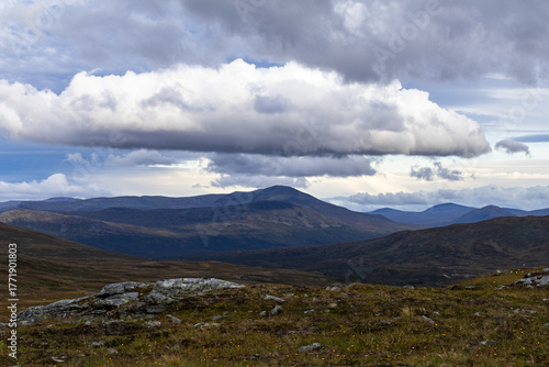 Dramatic clouds after rain over mountain peaks in Sweden Jämtland triangle hiking backpacking trail