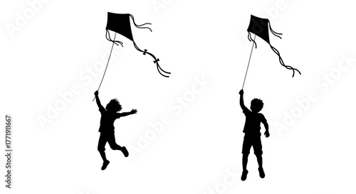 Silhouettes of children flying kites on a bright clear day