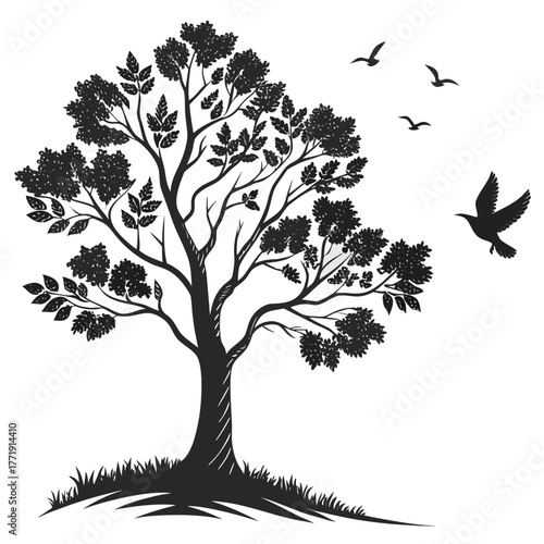 Silhouette of a tree with birds flying around