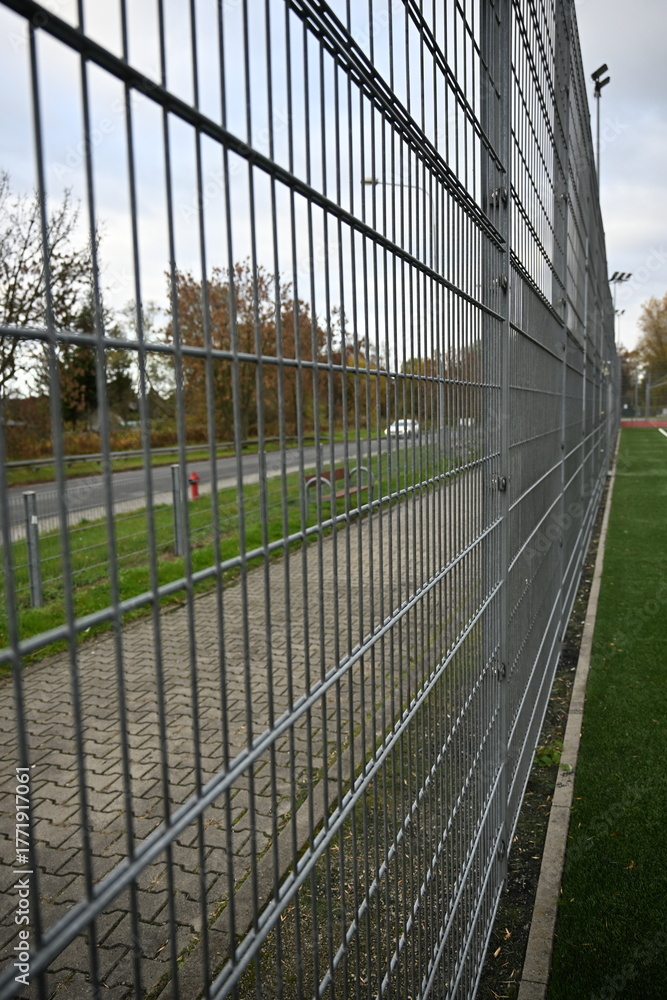 Obraz premium close up of metal fence grid 