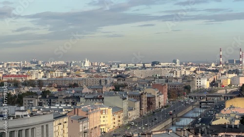 Wallpaper Mural Saint Petersburg.  Top view of Obvodny Canal embankment, rooftops of historic city center, and Smolny Cathedral in distance. Scenic view. Time lapse footage, accelerated video Torontodigital.ca