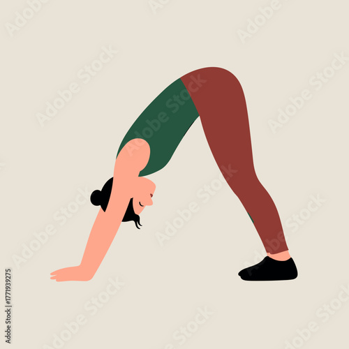 Woman performing yoga downward dog pose on neutral background  