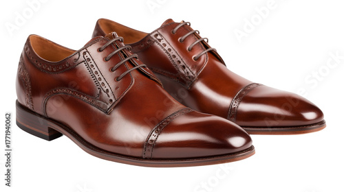 Brown leather pair of shoes isolated on white background or transparent png, stylish classic footwear with polished finish for formal or casual wear.